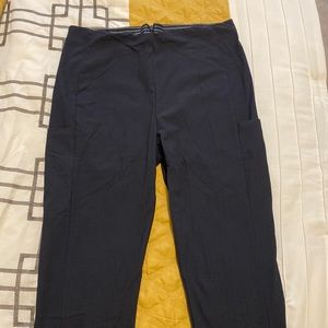 Athleta wander slim pant with small pocket on side size 10 NAVY BLUE